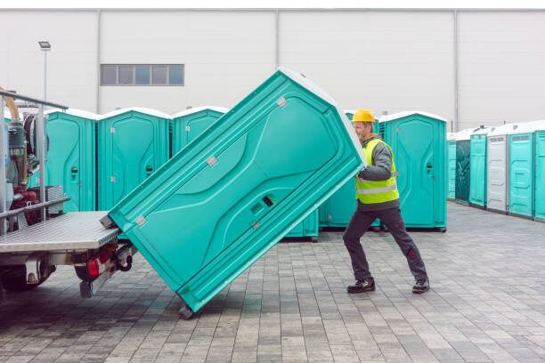Newport Beach Site Sanitation Co. crew delivering an emergency portable toilet unit